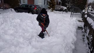 Spencer shoveling snow - VID_20160125_170422