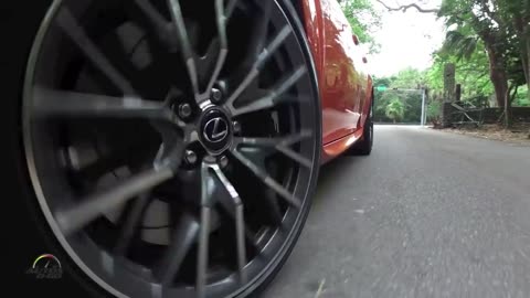 Why do car wheels spin backwards in videos??