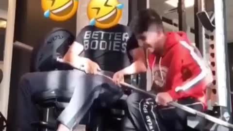 Boys laughing while lifting weight at GYM