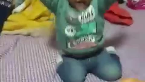 My baby dancing on the music