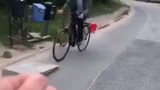 Guy leaves on head small bike ramp jump