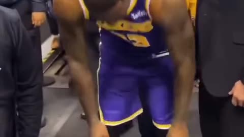 LeBron James gives kid his game worn shoes the night the Lakers break the assist record as a team