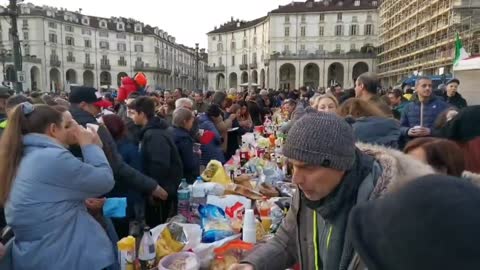 Italy, empty bars and restaurants in Turin because they ask for a health passport to enter. People bring food and drink from home