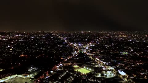 City lights at night aerial shot