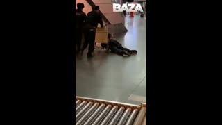 Airport Security Push Drunk Official On Luggage Trolley