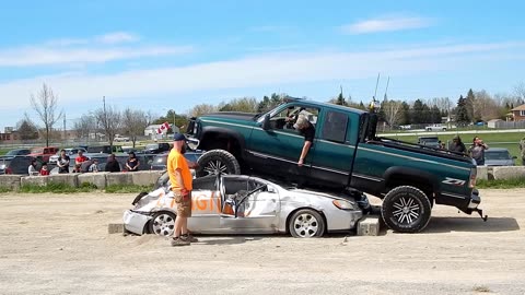 GMC Sierra Driving Over Cars, Rock Crawling and RTI Ramp GMC Truck