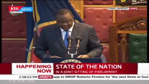 President Uhuru makes his way into the parliament chambers