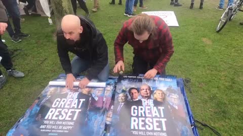 Activists distribute "great reset" poster in the Netherlands.