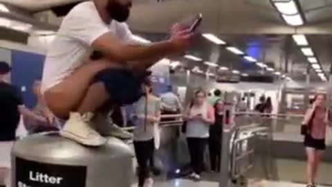 Men and women let this man shit in front of them in the subway