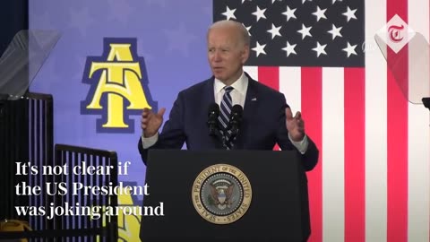 Moment Joe Biden shakes hands with thin air