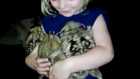 Girl Hugs Toads