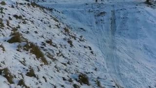 Cyclist in the Snow Overshoots Landing