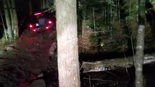 Diesel 80 series Land Cruiser climbs slippery hill