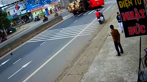 Truck Crashes into Bus