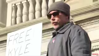 A man trolls reporters outside of the Kenosha courthouse by saying his name is "Brandon, Let's Go"