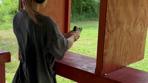 Our daughter in law shooting off some rounds at the shooting range!!!