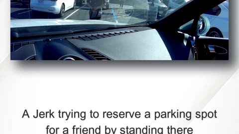 A Jerk trying to reserve a parking spot for a friend by standing there
