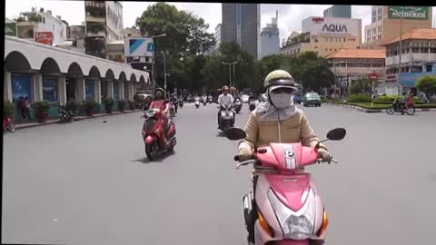 Vietnam, HCMC - Using a zebra crossing - 2014-06