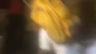 Yellow backpack piggy back surfboard kid falls off friends shoulders