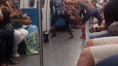 Subway pole dancing spiderman