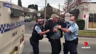 Australian storeowners are beaten and arrested for telling customers not to wear masks.