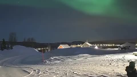 What is aurora borealis and where does it occur?