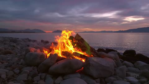 Campfire by Lake at Sunset