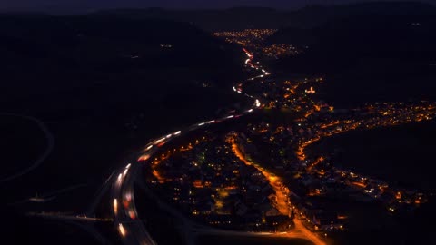 Evening brings a spectacle of vehicle lights as the streets and highways are lit up with headligh