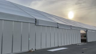 Installation of a large tent outside view