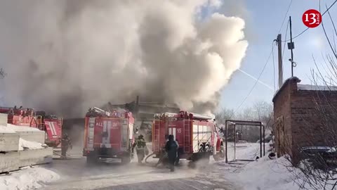 Image of a massive fire in a Russian warehouse where food and metal products are stored