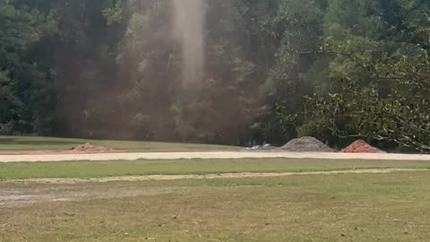 Long-Lived Tall Dust Devil In The Yard