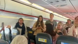 Christians Sing Jesus Song Mid-Flight