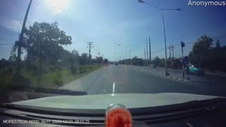 Speeding Car Spins Out Down Road
