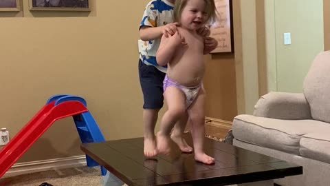 Jealous Brother Gives Dancing Sibling A Push