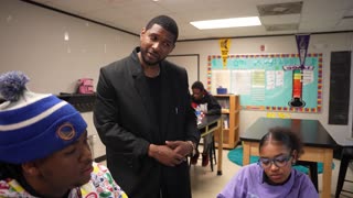 Usher makes a surprise visit to students and staff at his Usher's New Look Foundation