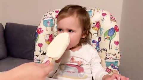 Cute_Baby_Tastes_Ice_Cream_for_the_First_Time
