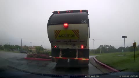 Garbage Truck Dumps on the Street