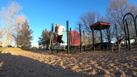 HIIT High intensity interval training on a mountain bike and Dips at the park playground