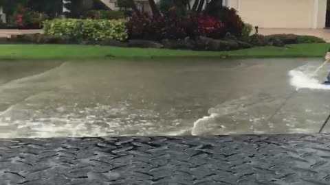 Tropical Storm Kneeboarding in the Streets