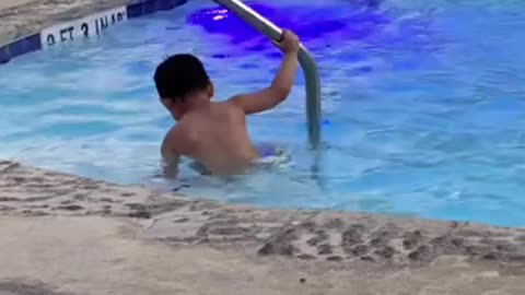 Dance small and cute boy in swimming🏊 pool