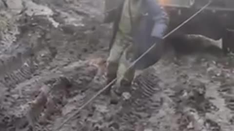 American supplied armoured vehicles stuck in mud in Ukraine.