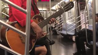 Two man mariachi singing subway cowboy hat