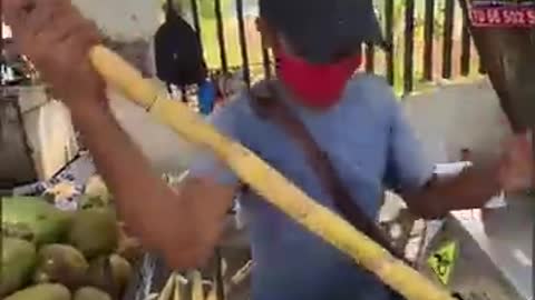 Hardworking Man Selling Sugarcane juice on Scooter