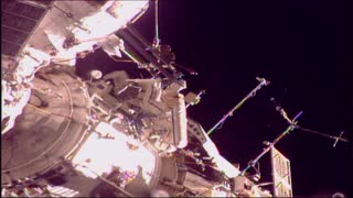 Space Station Cosmonauts take a Walk in Space