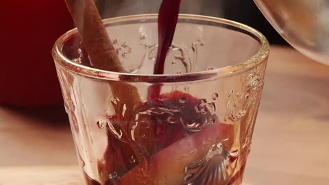 Pouring Mulled Wine to Glass