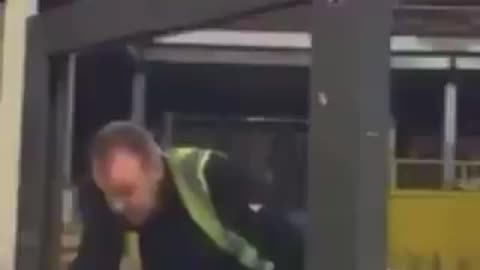 close call- man gets himself caught in package strap machine