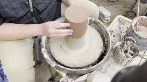 Trimming a Bottle on the Pottery Wheel