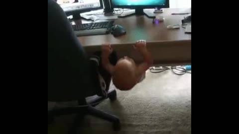 Baby trying to play computer games