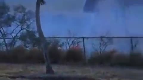 A video posted on August 8 at 6:43 am by a Lahaina resident shows a downed power line and flames
