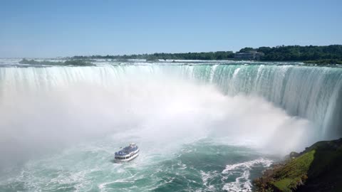 Tourist Boat Approaching Famous Horseshoe Waterfall at Niagara Falls